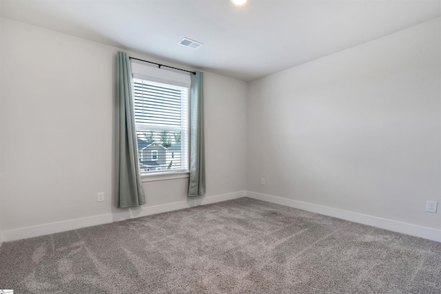 6 Shorncliffe Rd, Simpsonville, SC 29680 - carpeted empty room featuring baseboards