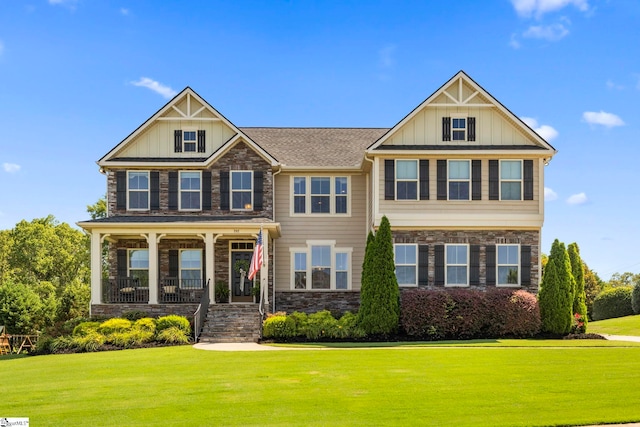 202 Princeton Dr, Duncan, SC 29334 - craftsman inspired home with stone siding, a front yard, and covered porch