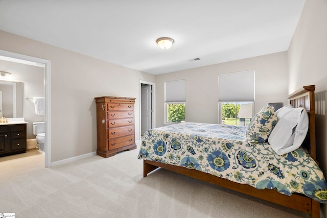 202 Princeton Dr, Duncan, SC 29334 - bedroom with light carpet and connected bathroom