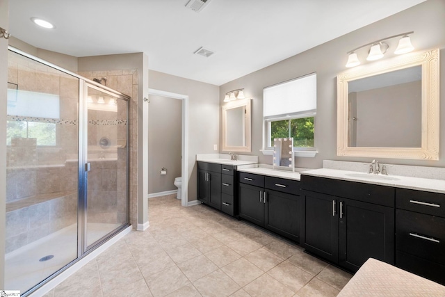 202 Princeton Dr, Duncan, SC 29334 - bathroom featuring double vanity, a shower stall, and tile patterned flooring