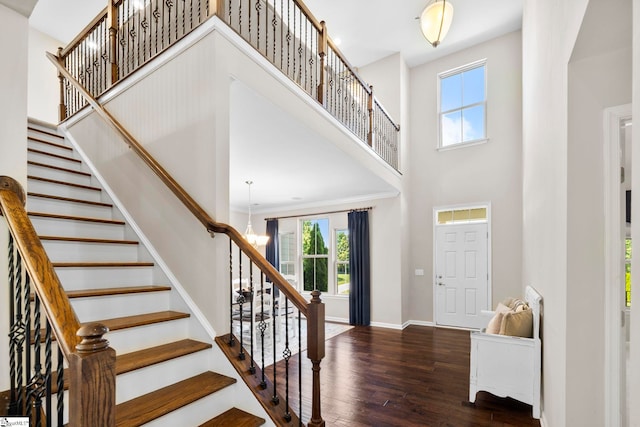 202 Princeton Dr, Duncan, SC 29334 - foyer entrance with a towering ceiling, wood finished floors, stairs, a chandelier, and arched walkways