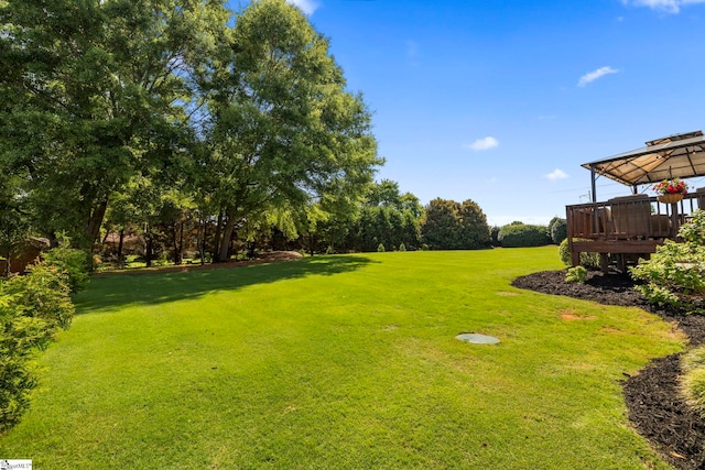 202 Princeton Dr, Duncan, SC 29334 - view of green lawn featuring a gazebo, a wooden deck, and view of scattered trees