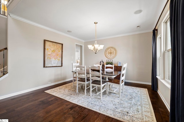 202 Princeton Dr, Duncan, SC 29334 - dining space with dark wood-style floors, a chandelier, and ornamental molding