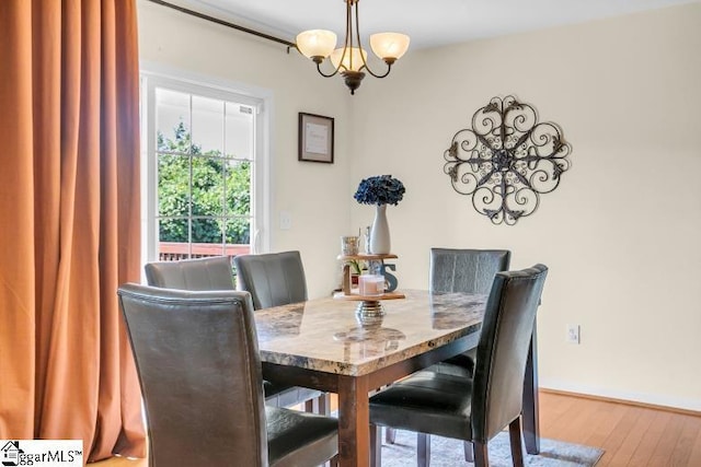 431 Lynnell Way, Moore, SC 29369 - dining area featuring a chandelier and wood finished floors