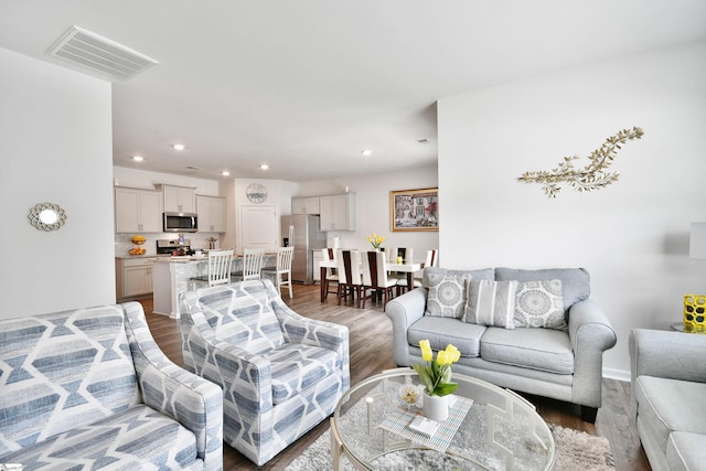 805 Colmore Trl, Lyman, SC 29365 - living room featuring wood finished floors and recessed lighting