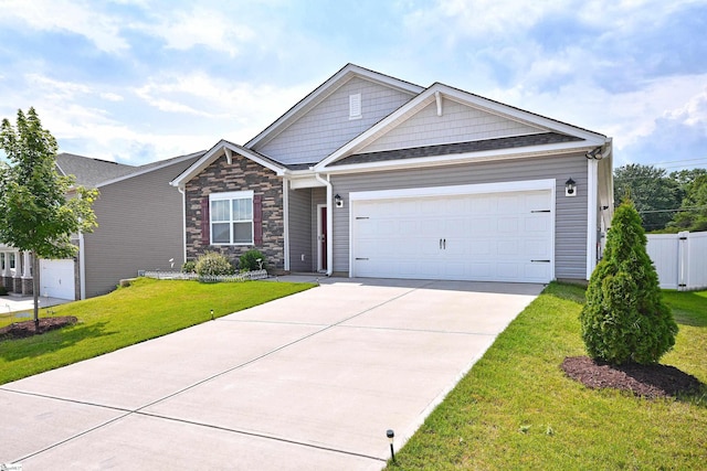 805 Colmore Trl, Lyman, SC 29365 - craftsman-style house with concrete driveway, an attached garage, and stone siding