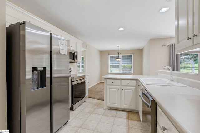 415 N Pond View Dr, Duncan, SC 29334 - kitchen featuring stainless steel appliances, a peninsula, white cabinetry, plenty of natural light, and recessed lighting