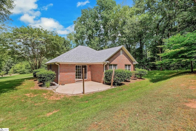 415 N Pond View Dr, Duncan, SC 29334 - back of property featuring brick siding, a patio area, a yard, and a shingled roof