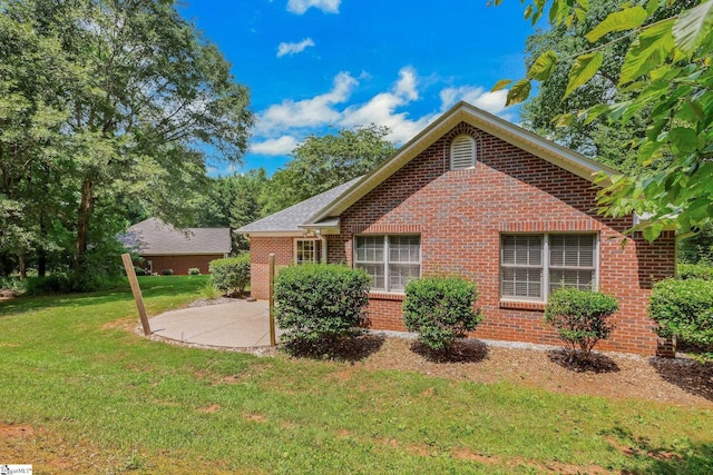 415 N Pond View Dr, Duncan, SC 29334 - view of property exterior featuring a yard, a patio area, and brick siding