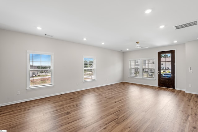 41 Leander Dr, Greer, SC 29651 - unfurnished room with wood finished floors, plenty of natural light, recessed lighting, and ceiling fan