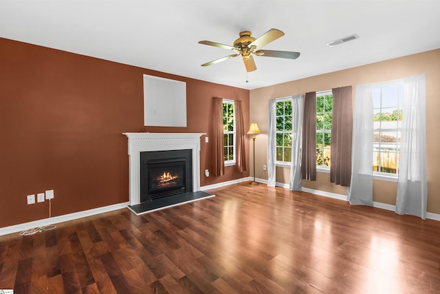 118 Moonshadow Ct, Duncan, SC 29334 - unfurnished living room with ceiling fan, wood finished floors, and a warm lit fireplace