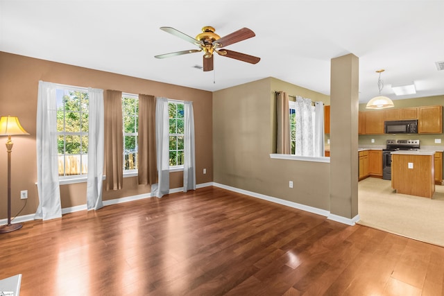 118 Moonshadow Ct, Duncan, SC 29334 - unfurnished living room featuring light wood-type flooring and ceiling fan