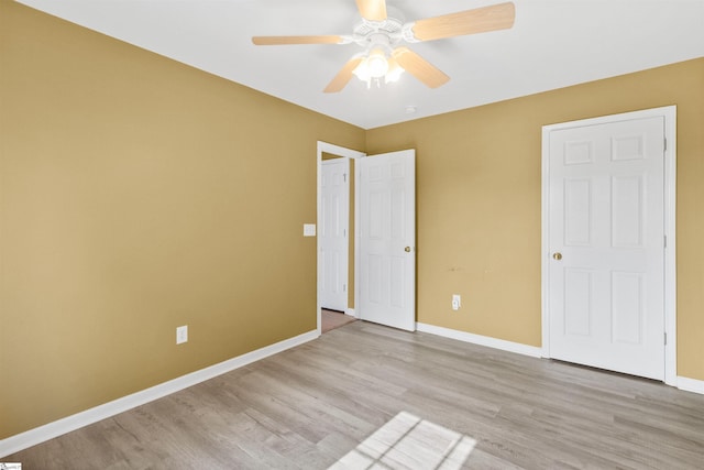 118 Moonshadow Ct, Duncan, SC 29334 - unfurnished bedroom featuring wood finished floors and a ceiling fan