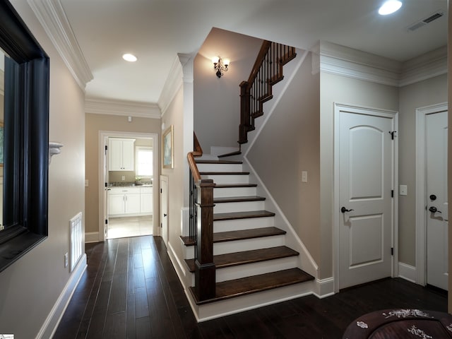 217 Andalusian Trl, Anderson, SC 29621 - entryway featuring stairs, dark wood-type flooring, recessed lighting, and ornamental molding