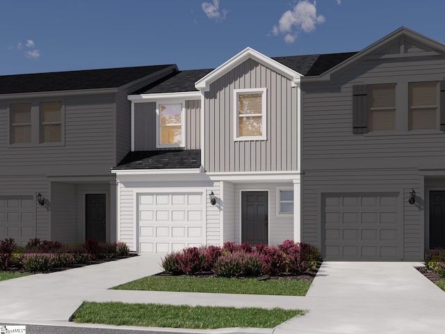 845 Ernest Ln, Lyman, SC 29365 - view of front of house featuring an attached garage, driveway, and board and batten siding
