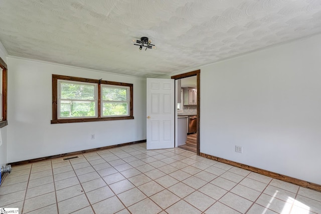 160 Bill Roberson Rd, Enoree, SC 29335 - empty room featuring baseboards and light tile patterned floors
