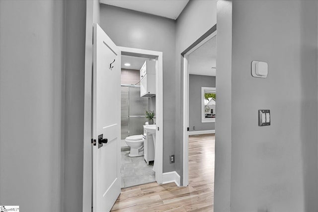 23 Stringer St, Belton, SC 29627 - hallway featuring light wood-style floors and baseboards