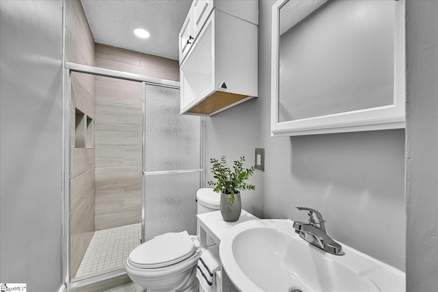 23 Stringer St, Belton, SC 29627 - bathroom featuring a shower stall, vanity, and recessed lighting