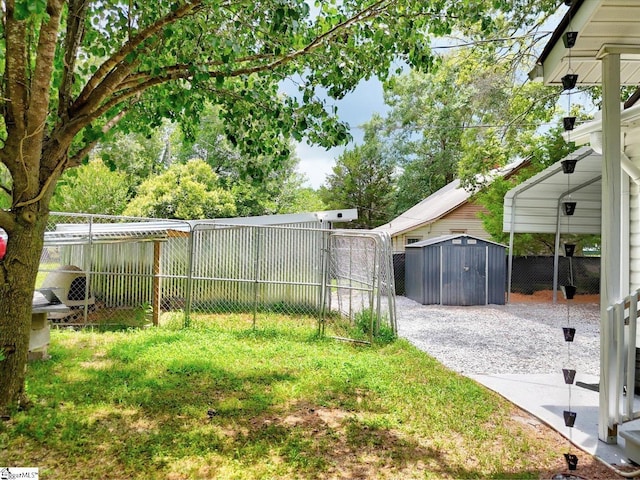 23 Stringer St, Belton, SC 29627 - fenced backyard with a storage unit