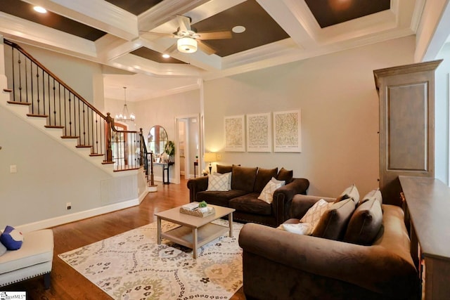 108 Ledgestone Way, Greer, SC 29651 - living room with stairway, coffered ceiling, wood finished floors, beam ceiling, and ceiling fan