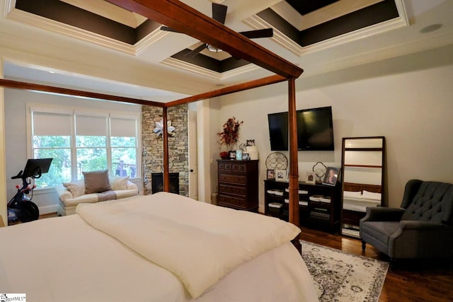 108 Ledgestone Way, Greer, SC 29651 - bedroom featuring crown molding, dark wood-style floors, a stone fireplace, coffered ceiling, and beam ceiling