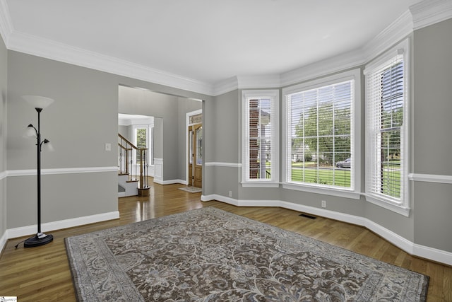 509 Wentworth Farm Cir, Boiling Springs, SC 29316 - empty room featuring stairs, wood finished floors, and ornamental molding