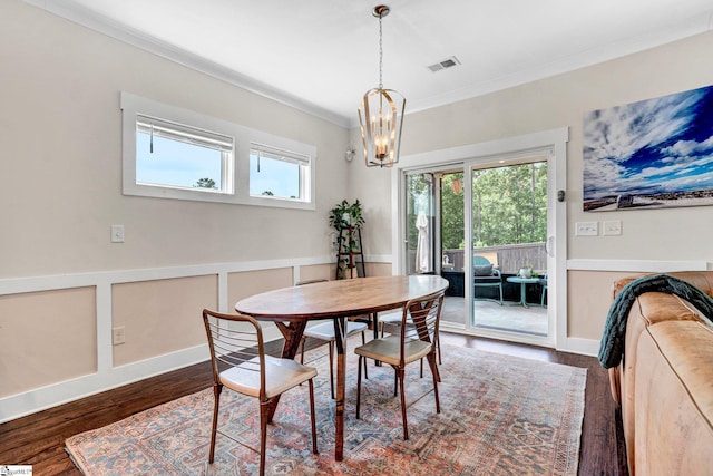 214 Terrapin Cross Way, Simpsonville, SC 29680 - dining area with ornamental molding, a chandelier, and wood finished floors