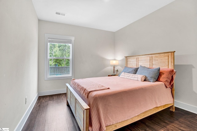 214 Terrapin Cross Way, Simpsonville, SC 29680 - bedroom featuring baseboards and dark wood-type flooring