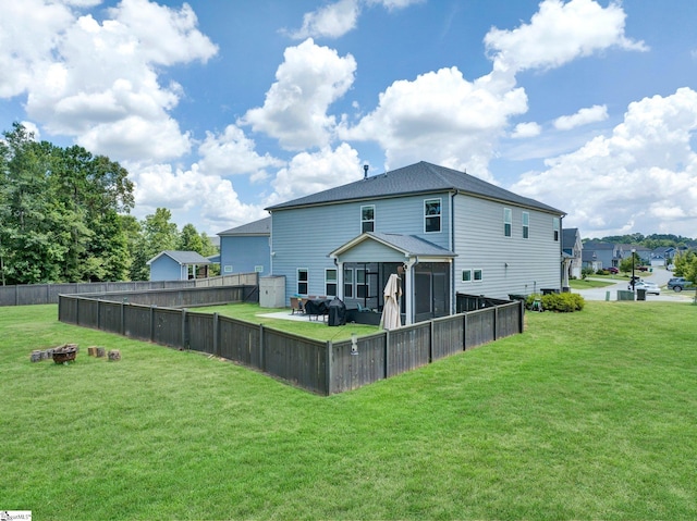 214 Terrapin Cross Way, Simpsonville, SC 29680 - rear view of property with a fire pit, a fenced backyard, and a sunroom