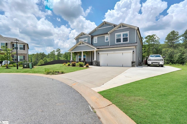 214 Terrapin Cross Way, Simpsonville, SC 29680 - craftsman-style house with concrete driveway, stone siding, a front lawn, a garage, and a porch