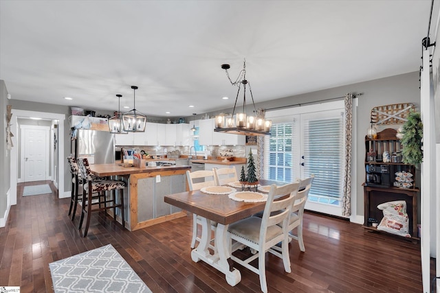 301 Ridgecrest Dr, Easley, SC 29640 - dining space featuring a chandelier, dark wood-type flooring, and recessed lighting