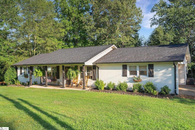 301 Ridgecrest Dr, Easley, SC 29640 - ranch-style house featuring a front lawn, brick siding, roof with shingles, and a porch