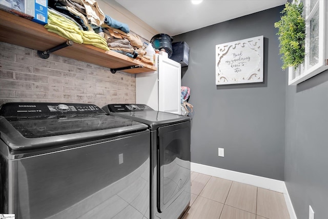 301 Ridgecrest Dr, Easley, SC 29640 - laundry room with independent washer and dryer and light tile patterned flooring