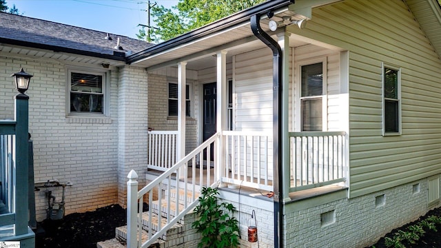 301 Ridgecrest Dr, Easley, SC 29640 - property entrance featuring crawl space, brick siding, and covered porch