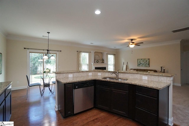 kitchen featuring light stone counters, dark hardwood / wood-style floors, dishwasher, ceiling fan with notable chandelier, and sink