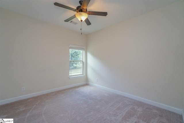 empty room with light carpet and ceiling fan