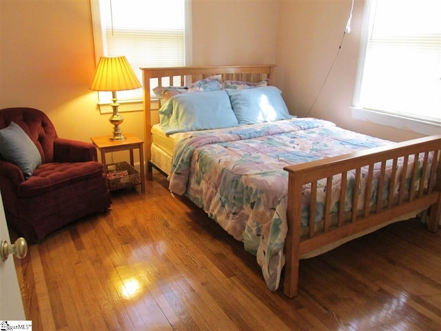 bedroom featuring hardwood / wood-style floors