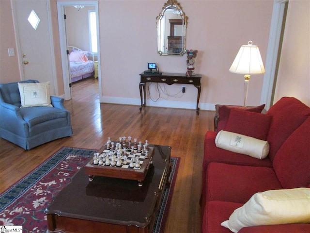 living room featuring dark hardwood / wood-style flooring