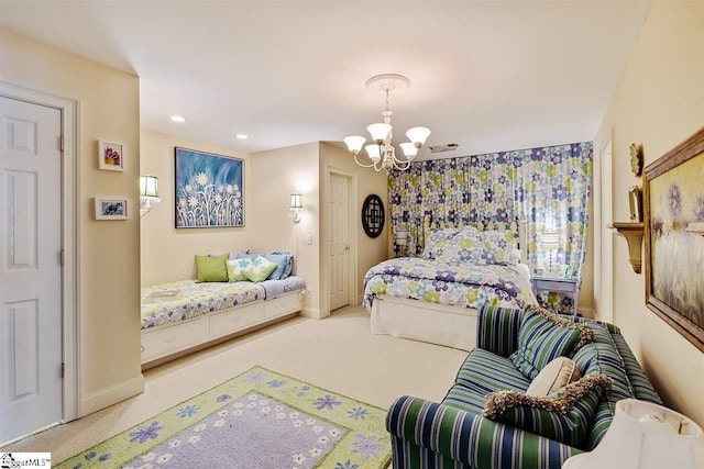 bedroom featuring an inviting chandelier and light colored carpet