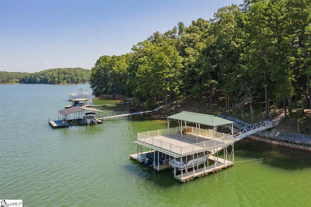 view of dock with a water view