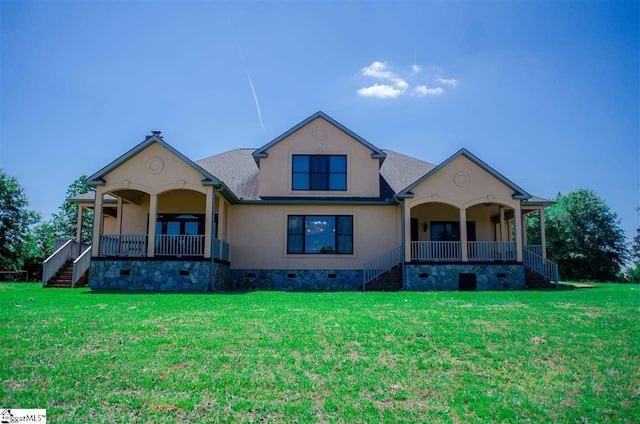 view of front of home with a porch and a front yard