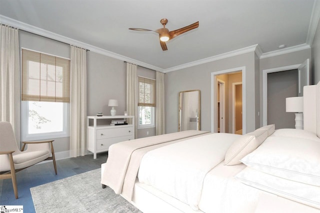 bedroom featuring ceiling fan and ornamental molding