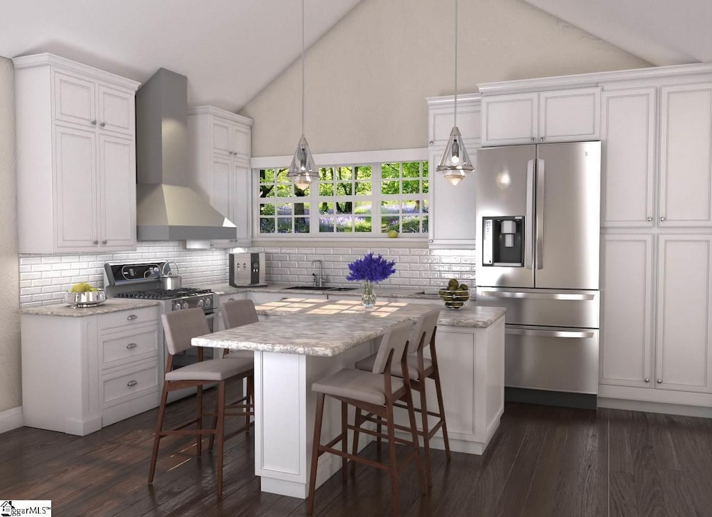 kitchen featuring dark hardwood / wood-style floors, decorative light fixtures, appliances with stainless steel finishes, and wall chimney range hood