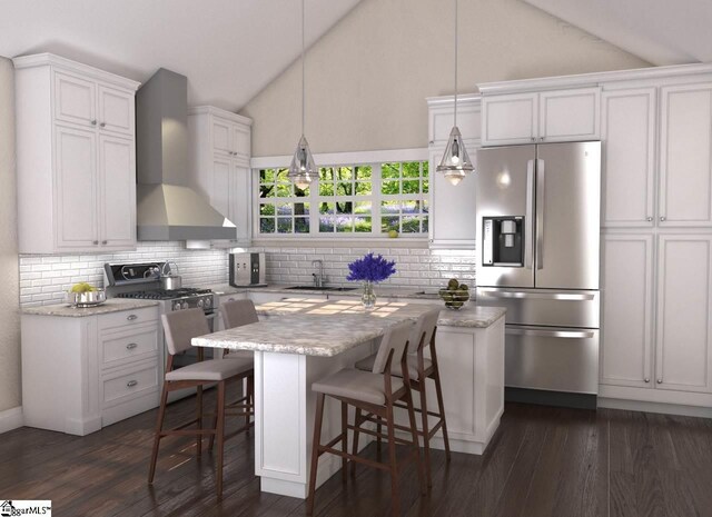 kitchen featuring dark hardwood / wood-style floors, decorative light fixtures, appliances with stainless steel finishes, and wall chimney range hood