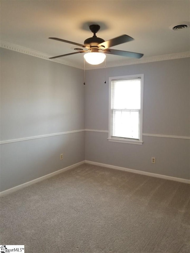 empty room with carpet and ceiling fan