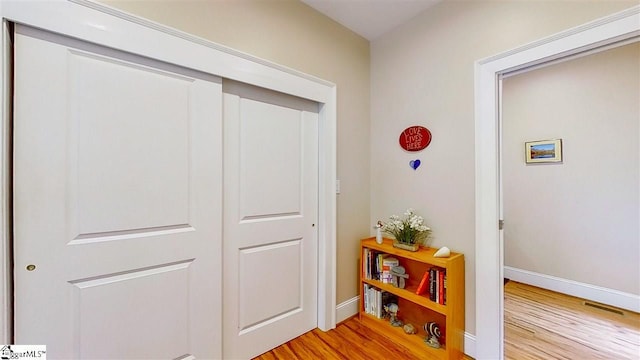 hall featuring light hardwood / wood-style flooring