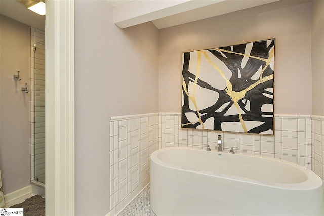 bathroom featuring tile walls, tile floors, and independent shower and bath