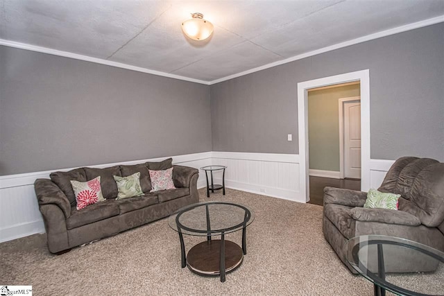 living room with crown molding and carpet floors