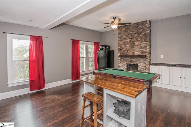 playroom with pool table, dark hardwood / wood-style floors, ceiling fan, and a fireplace