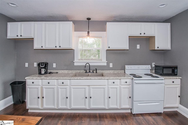 kitchen with white cabinets, decorative light fixtures, white electric range oven, and sink